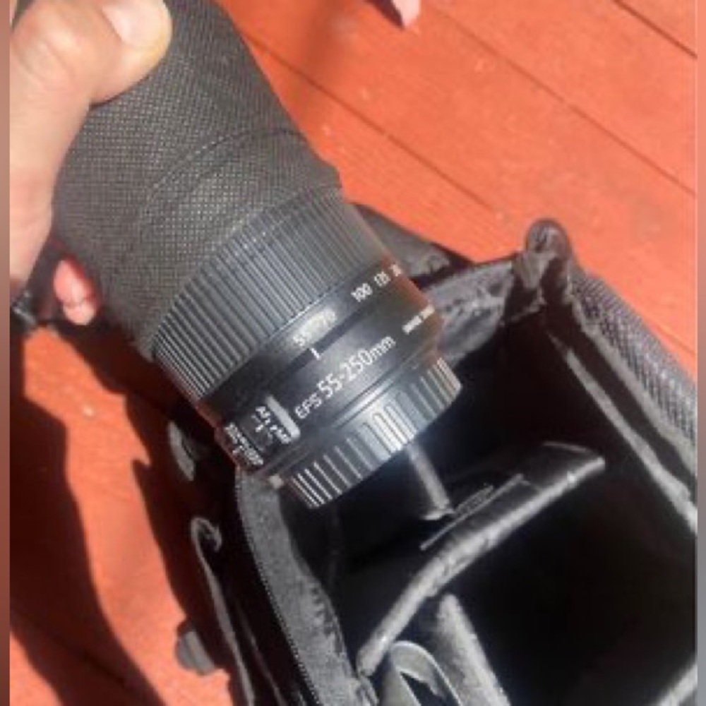 Canon Rebel EOS T3 Camera, Rebel Gadget Bag, Battery Charger, extra 55-25mm lens